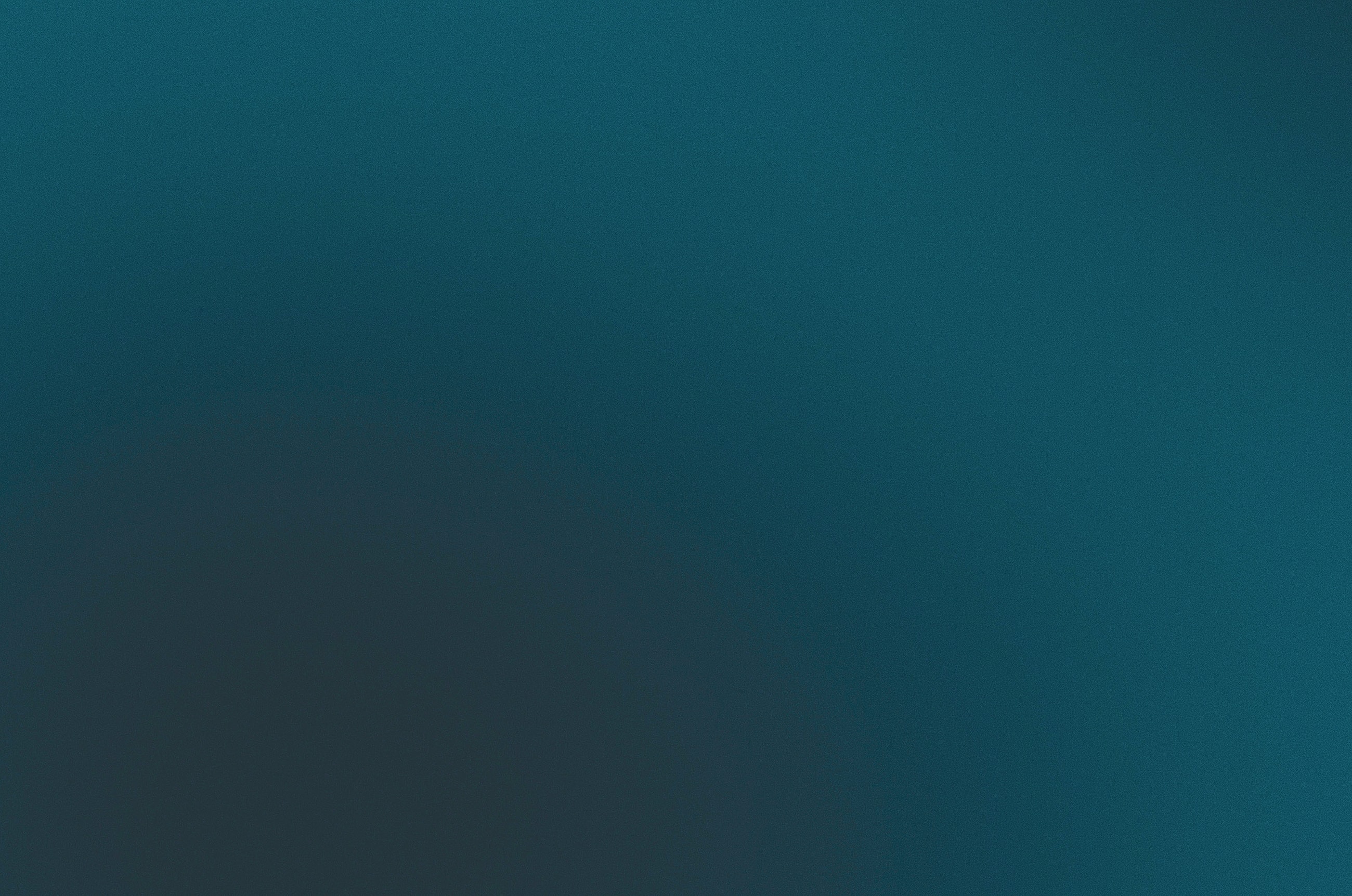 Abstract dark teal gradient background image.