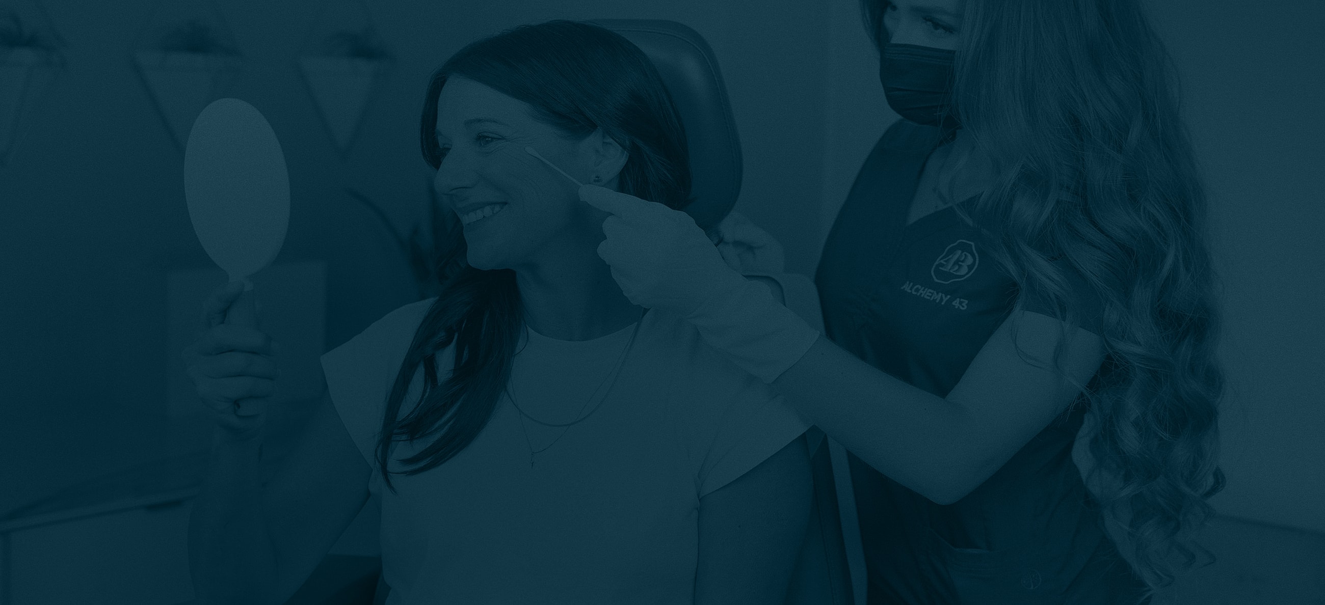 Patient consultation in aesthetic treatment setting.