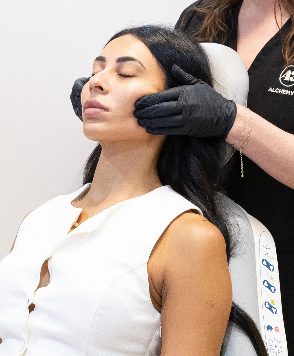 Injecting lip filler in a cosmetic procedure.