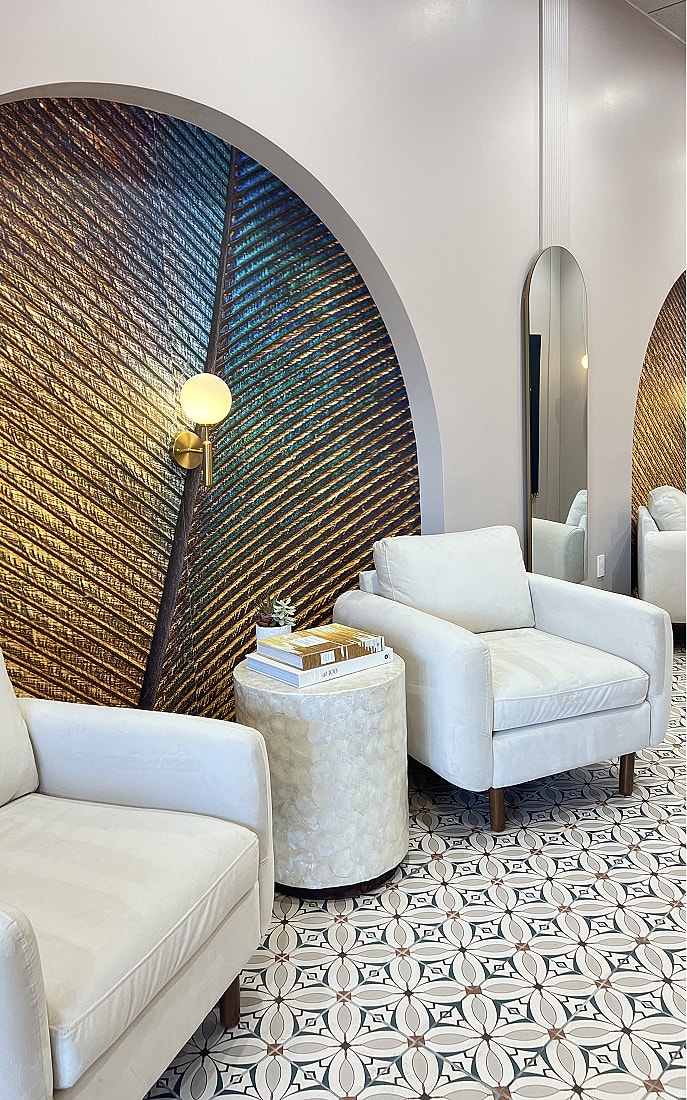 Modern lounge area with stylish decor and furniture.