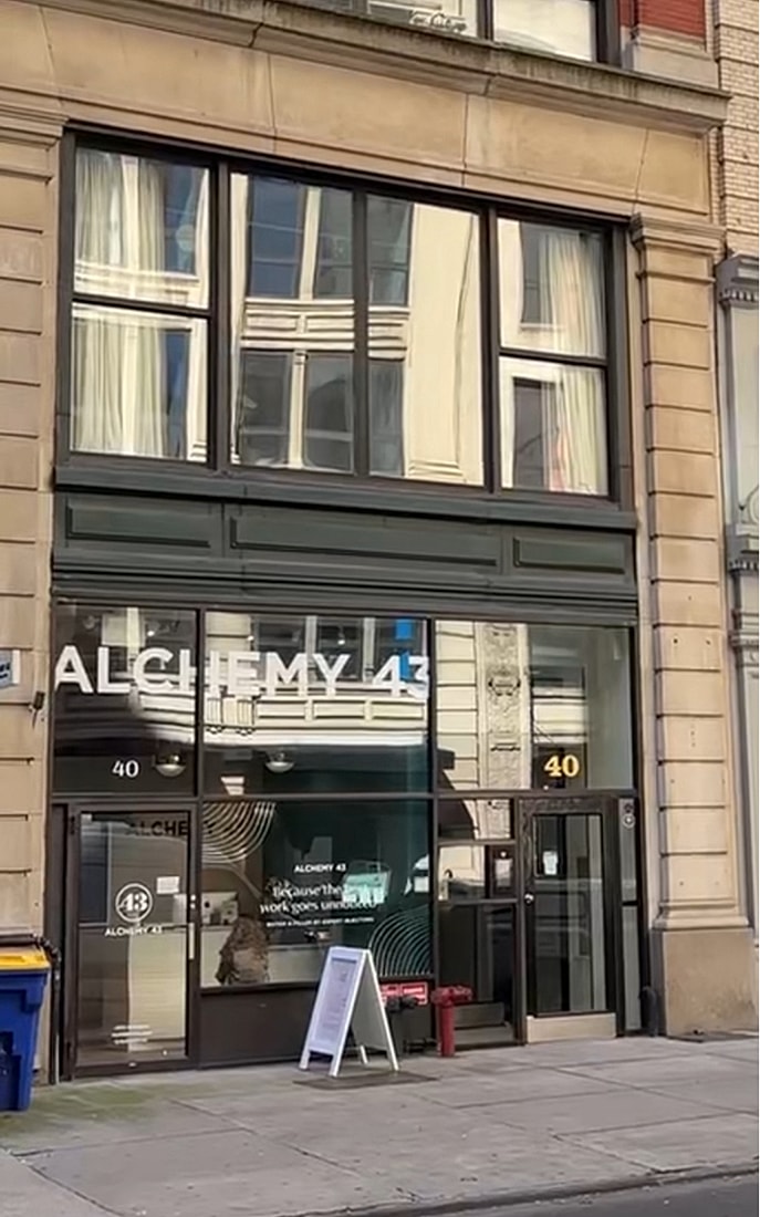 Entrance of Alchemy 43 at street level.