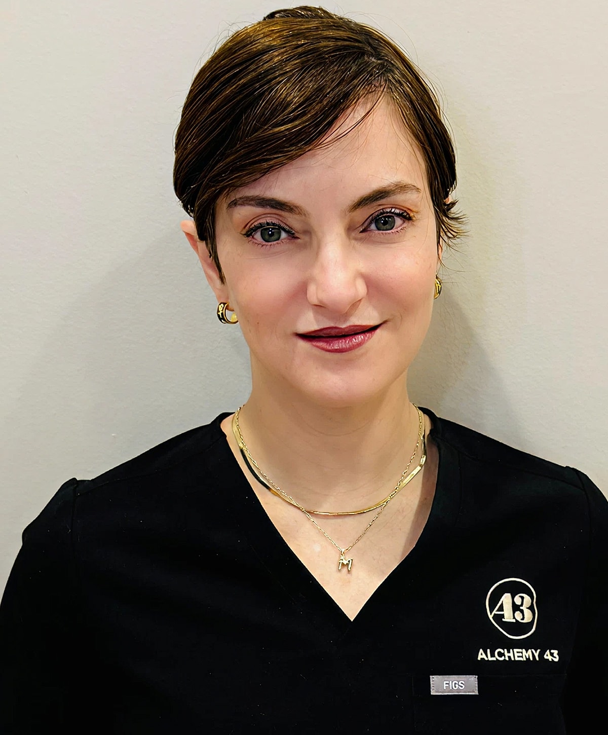 Professional individual wearing uniform at Alchemy 43.