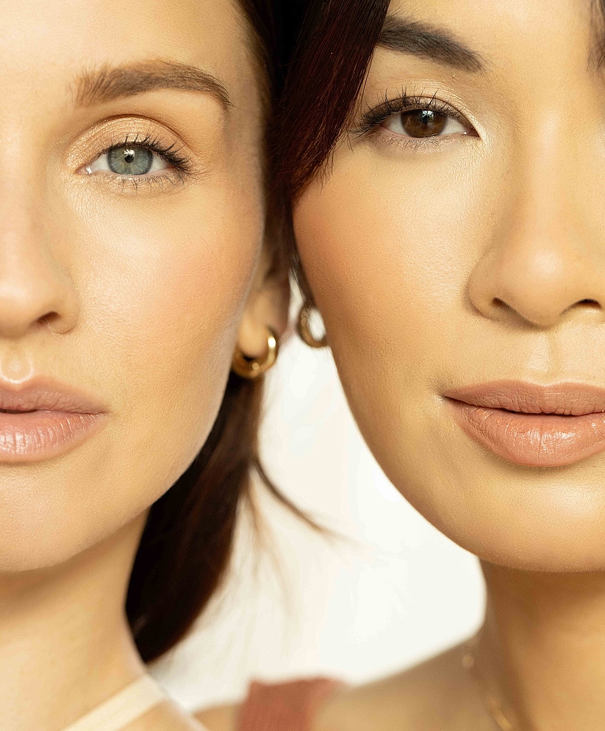 Two women showcasing natural makeup looks.