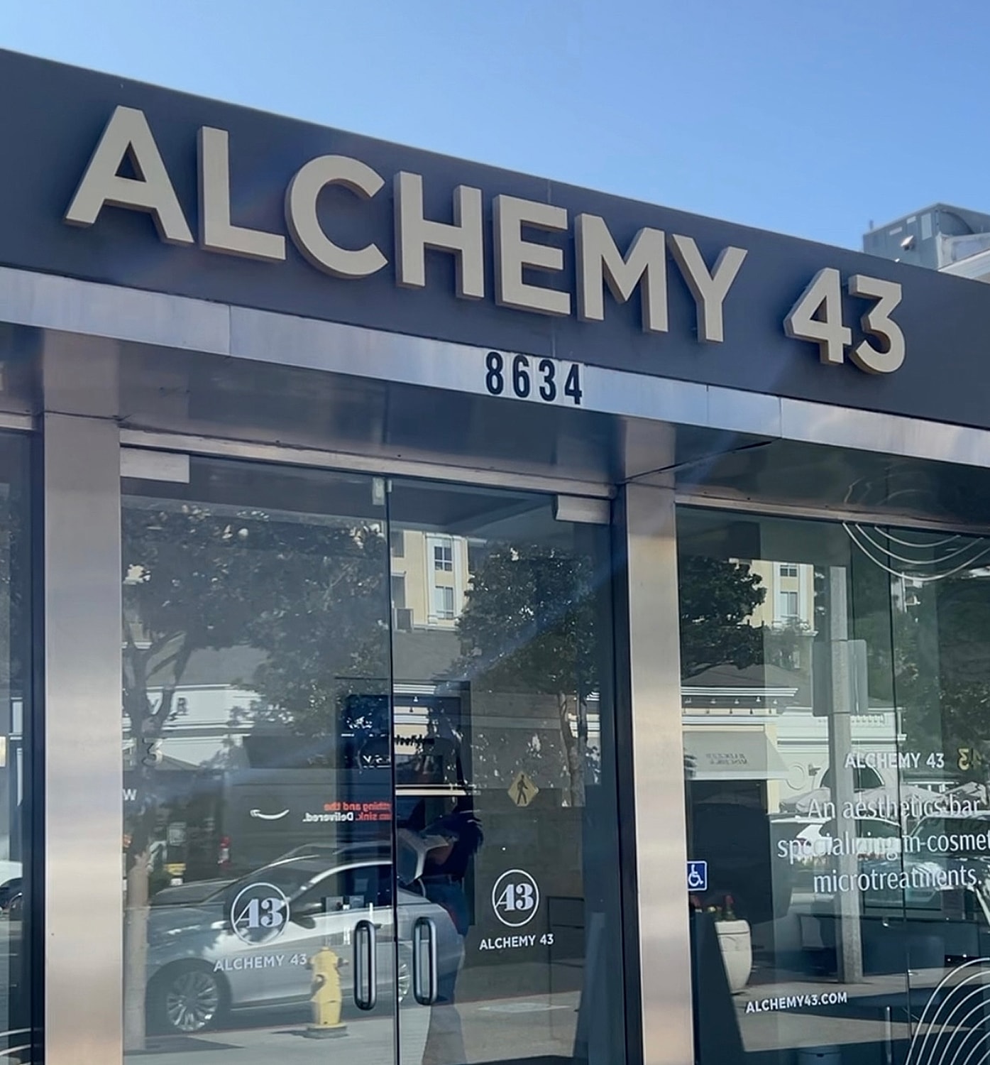 Sign for Alchemy 43 cosmetic microtreatment studio.