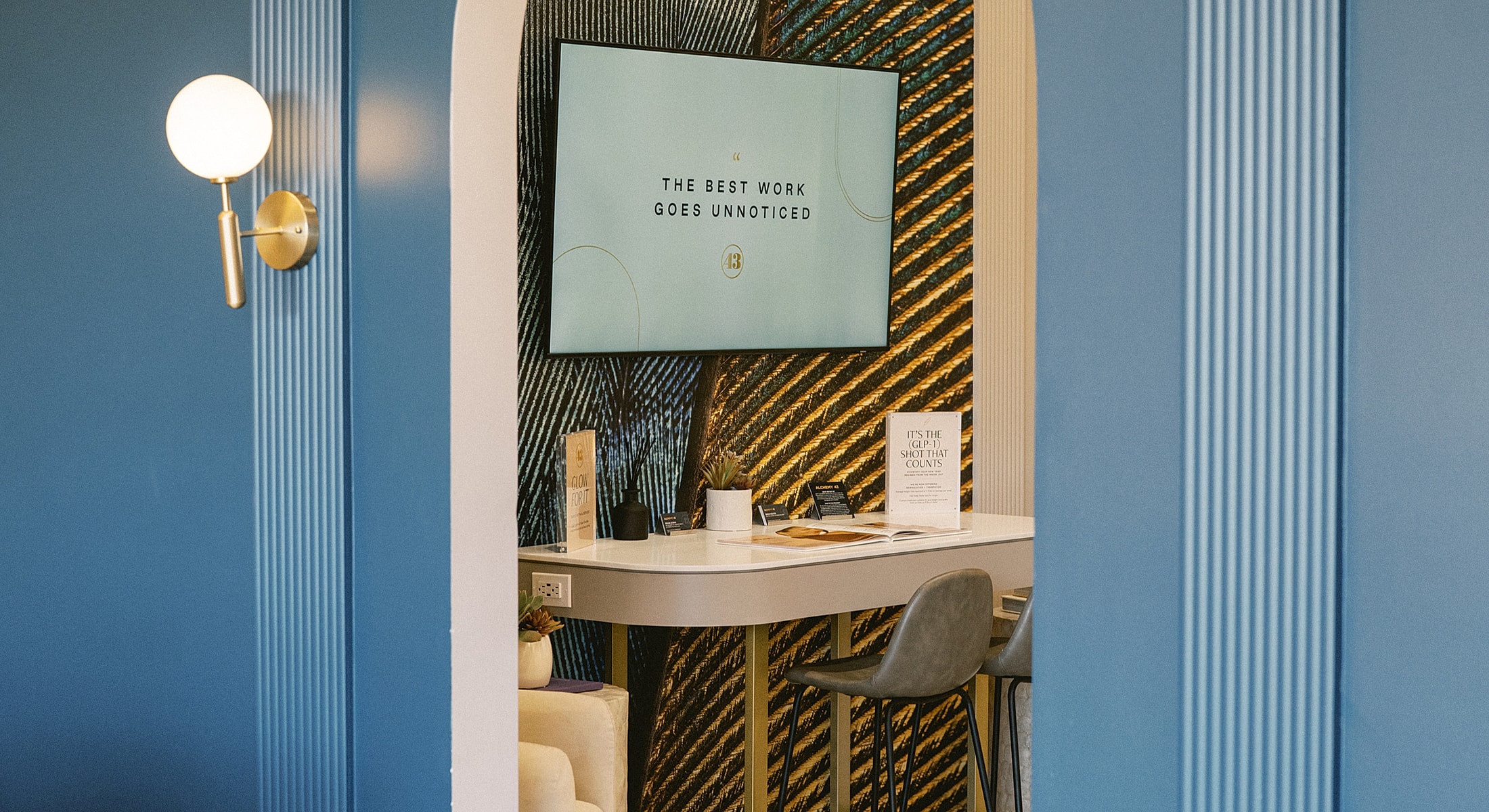 Modern workspace with inspirational wall art.